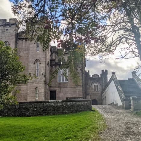 Torrisdale Castle viewed from its wooded grounds