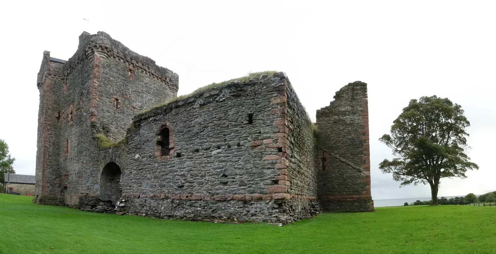The stone walls and tower of Skipness Castle