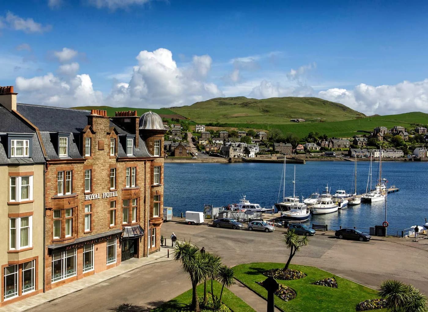 The Royal Hotel beside Campbeltown Harbour and moored boats